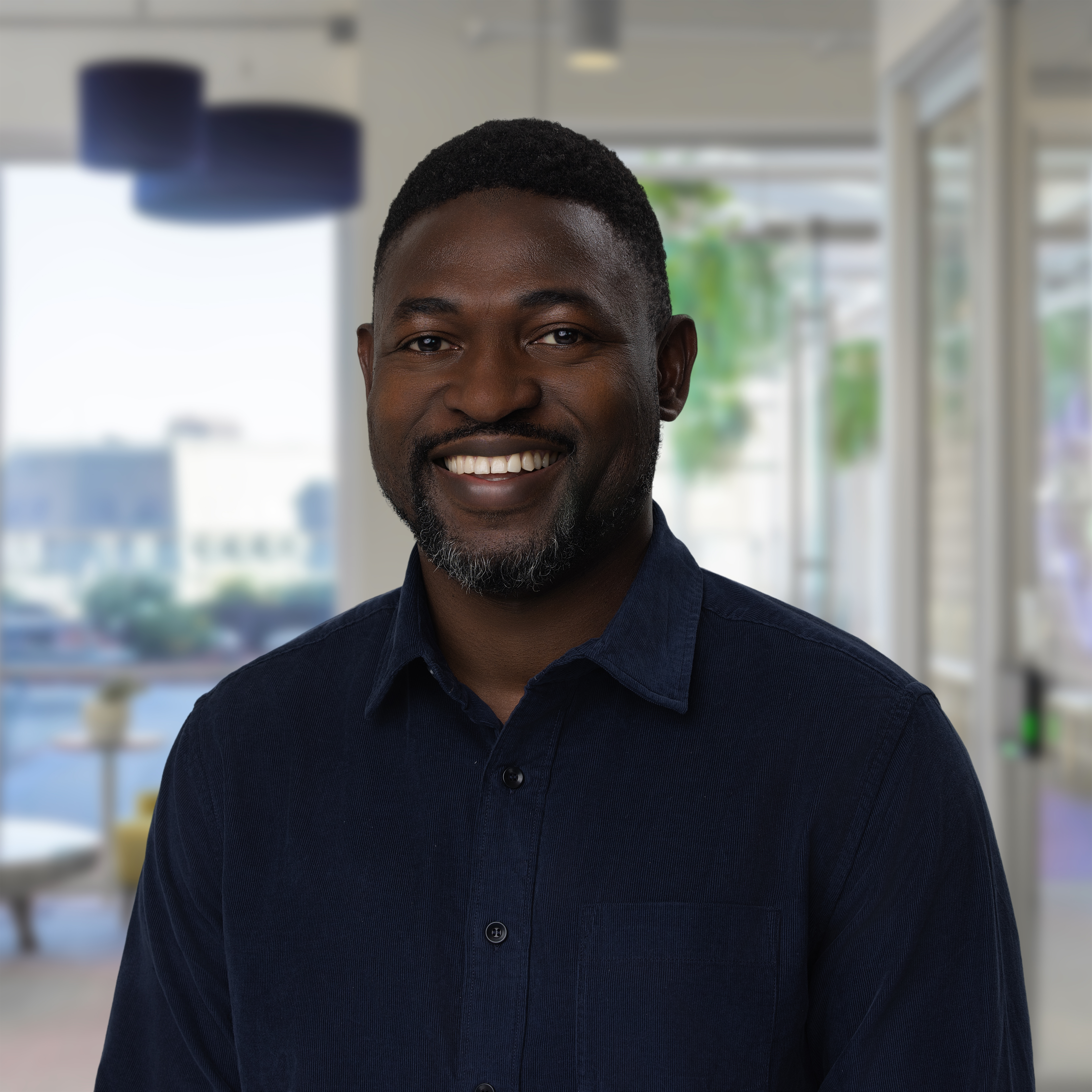 Headshot of Akin Oyedele, Partner at Boston Consulting Group