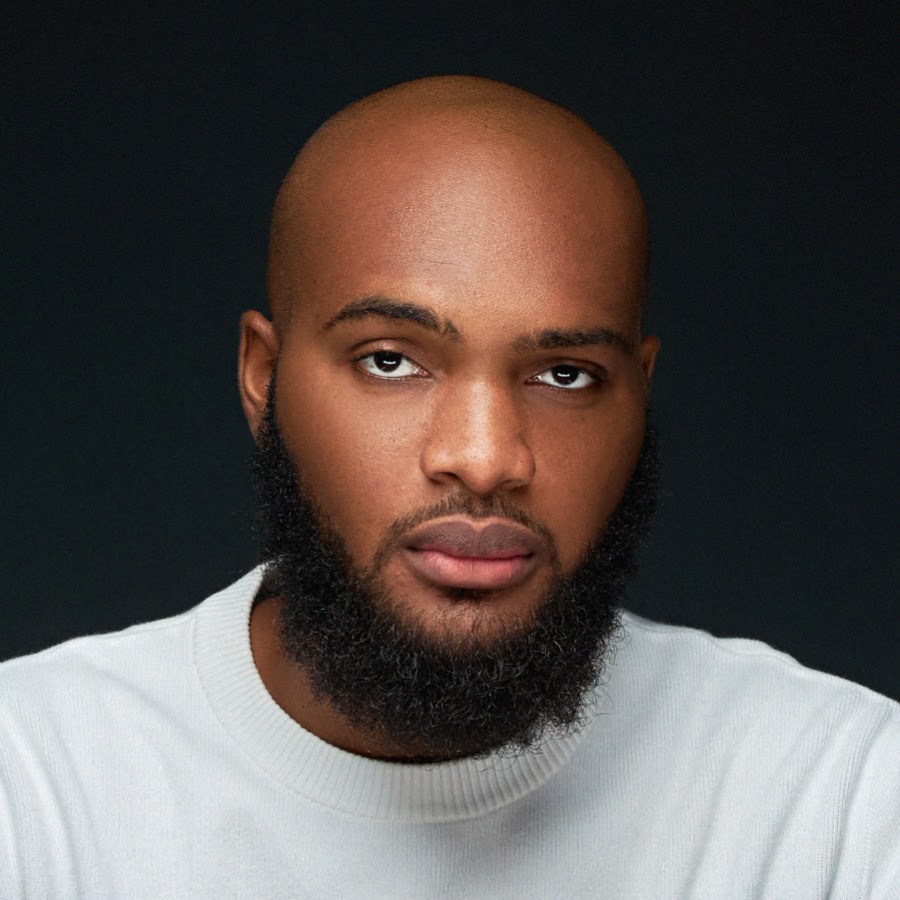 Headshot of Tayo Aina
