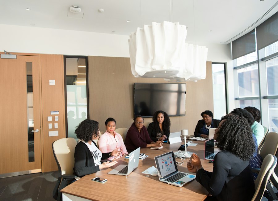 Founders working together around a boardroom table